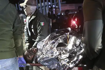 38 migrants dead in Mexico detention center fire.