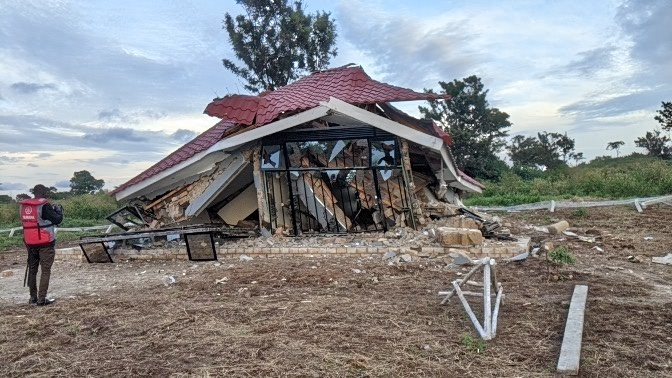 Updf Major in tears as goons knock down his mansion on lake Victoria Island.